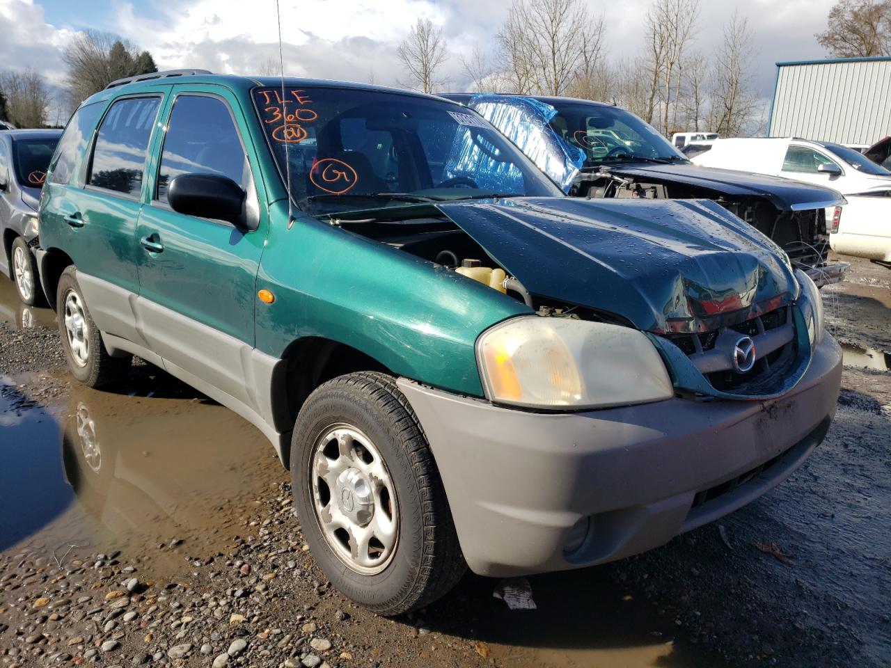 MAZDA TRIBUTE DX 2001 with VIN 4F2YU06141KM59934 - Photo from auction