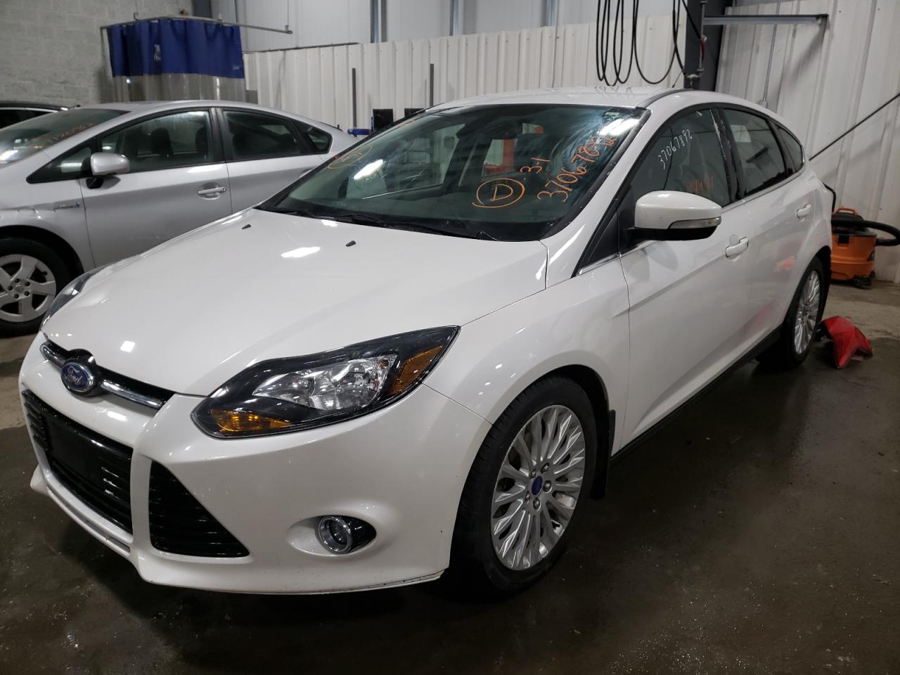 Photo 2 from auction – 2012 FORD FOCUS TITA with VIN 1FAHP3N23CL215634
