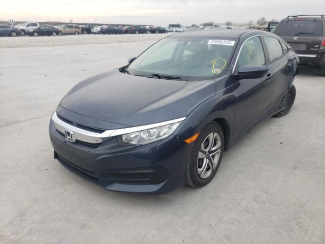 Photo 2 from auction – 2018 HONDA CIVIC LX with VIN 2HGFC2F54JH579332
