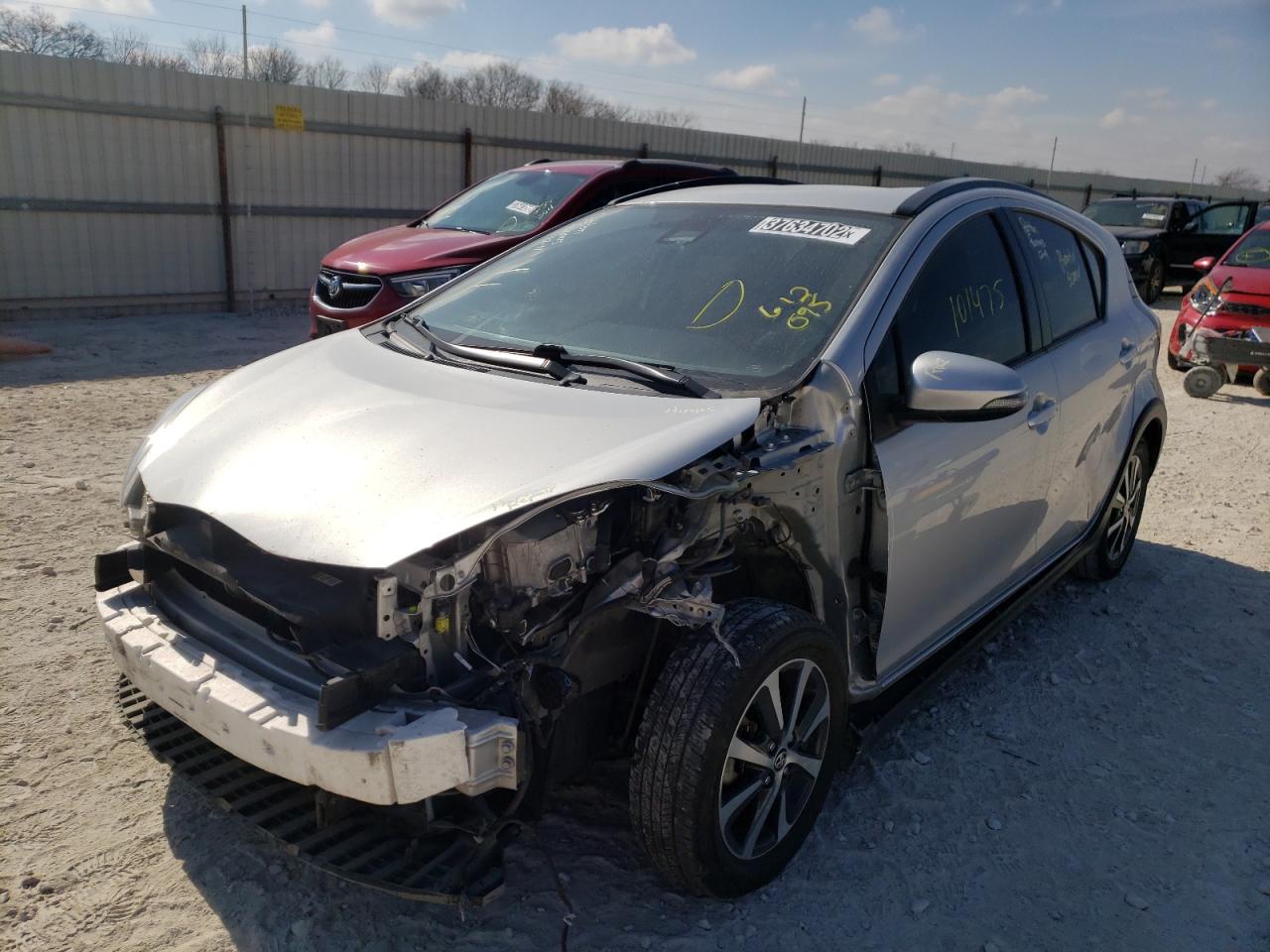 Photo 2 from auction – 2018 TOYOTA PRIUS C with VIN JTDKDTB33J1612095