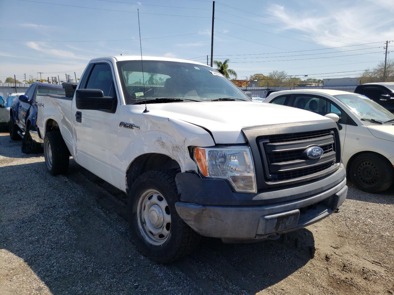 FORD F150 2014 with VIN 1FTMF1EM5EKG34949 - Photo from auction