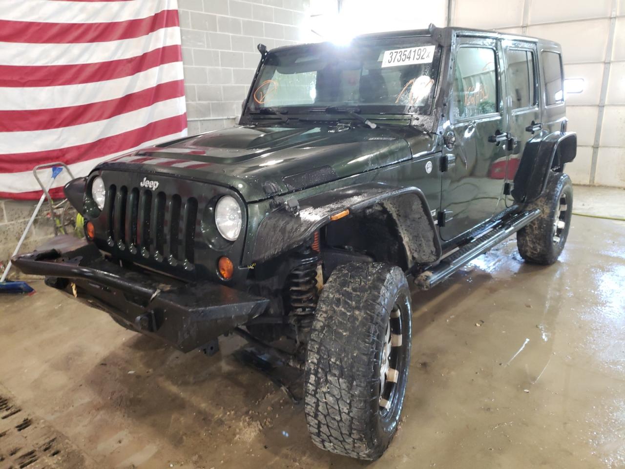 Photo 9 from auction – 2011 JEEP WRANGLER U with VIN 1J4BA3H14BL523537