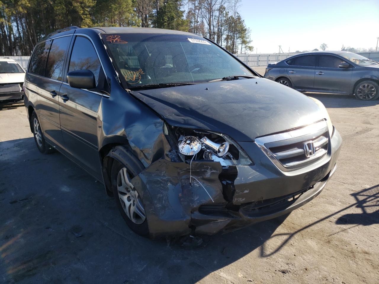 HONDA ODYSSEY 2005 with VIN 5FNRL38765B050329 - Photo from auction