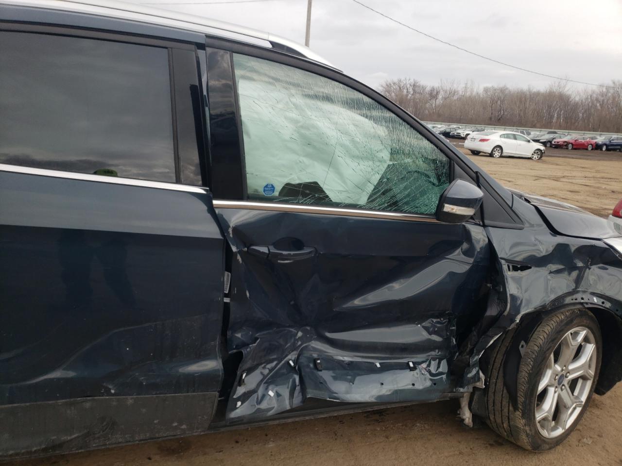 Photo 9 from auction – 2019 FORD ESCAPE TIT with VIN 1FMCU9J99KUC29092