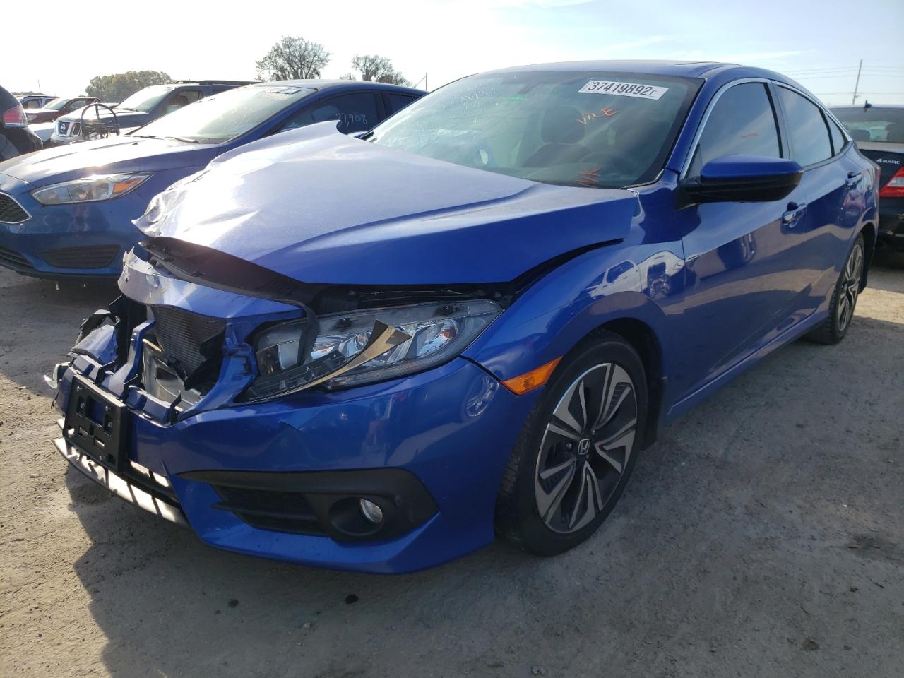 Photo 2 from auction – 2017 HONDA CIVIC EX with VIN 19XFC1F33HE005043