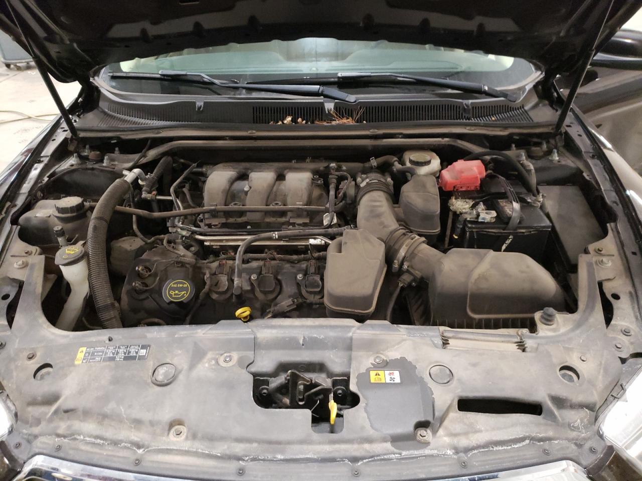Photo 7 from auction – 2014 FORD TAURUS SEL with VIN 1FAHP2E89EG160195