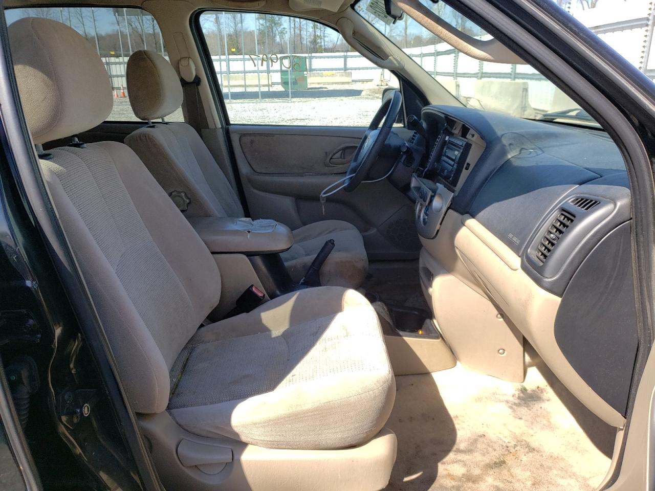 Photo 5 from auction – 2004 MAZDA TRIBUTE LX with VIN 4F2YZ04134KM21247