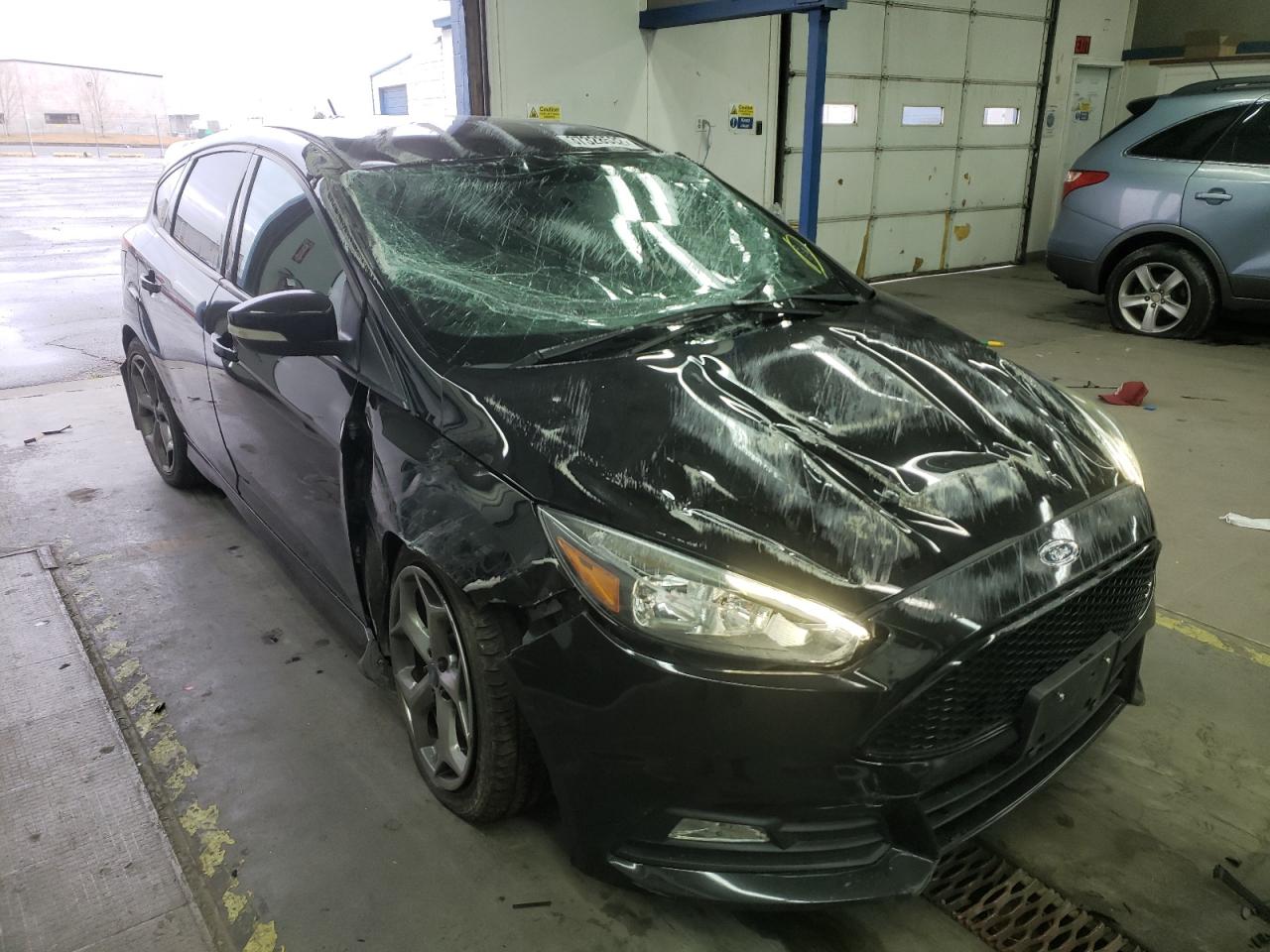 FORD FOCUS ST 2017 with VIN 1FADP3L99HL277478 - Photo from auction