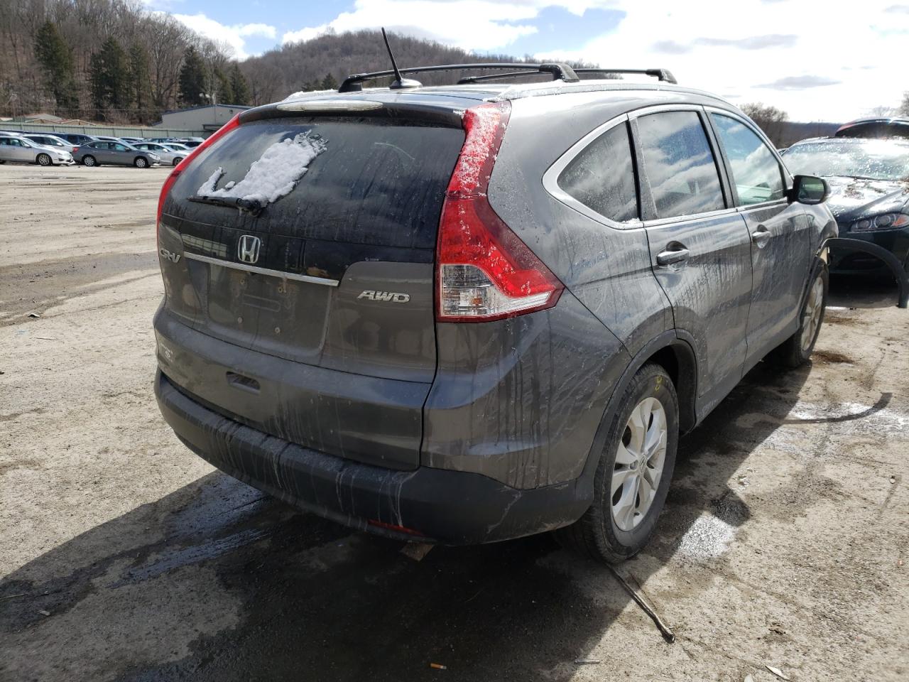Photo 4 from auction – 2014 HONDA CR-V EXL with VIN 2HKRM4H72EH639950