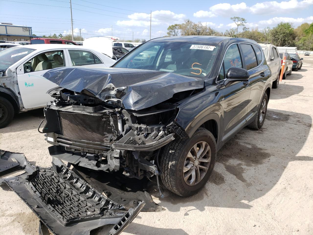 Photo 2 from auction – 2019 HYUNDAI SANTA FE S with VIN 5NMS2CAD3KH073517
