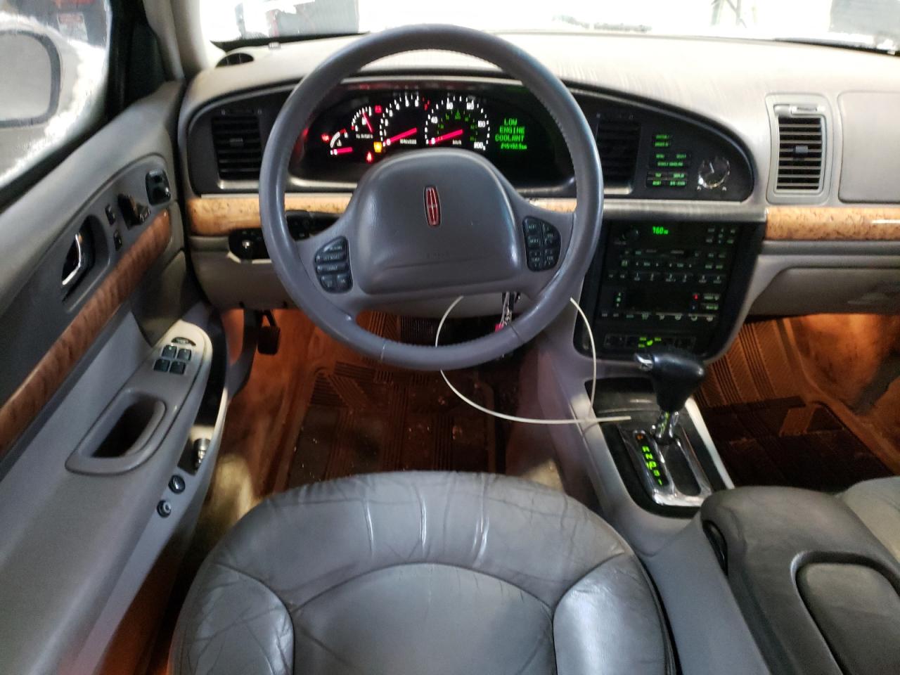 Photo 9 from auction – 1999 LINCOLN CONTINENTA with VIN 1LNHM97V2XY656124
