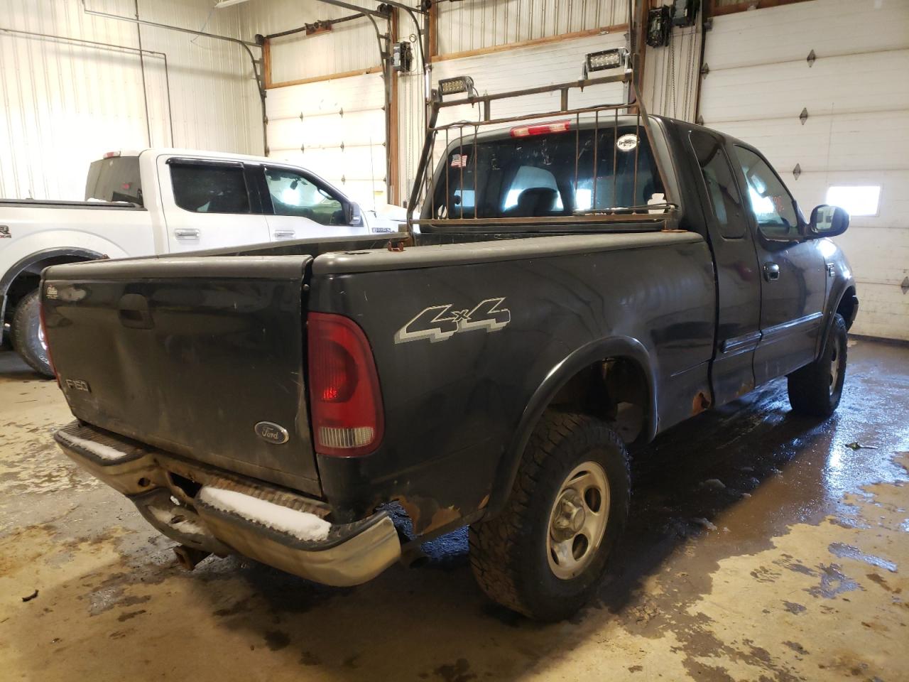 Photo 4 from auction – 2003 FORD F150 with VIN 1FTRX18WX3NA20393