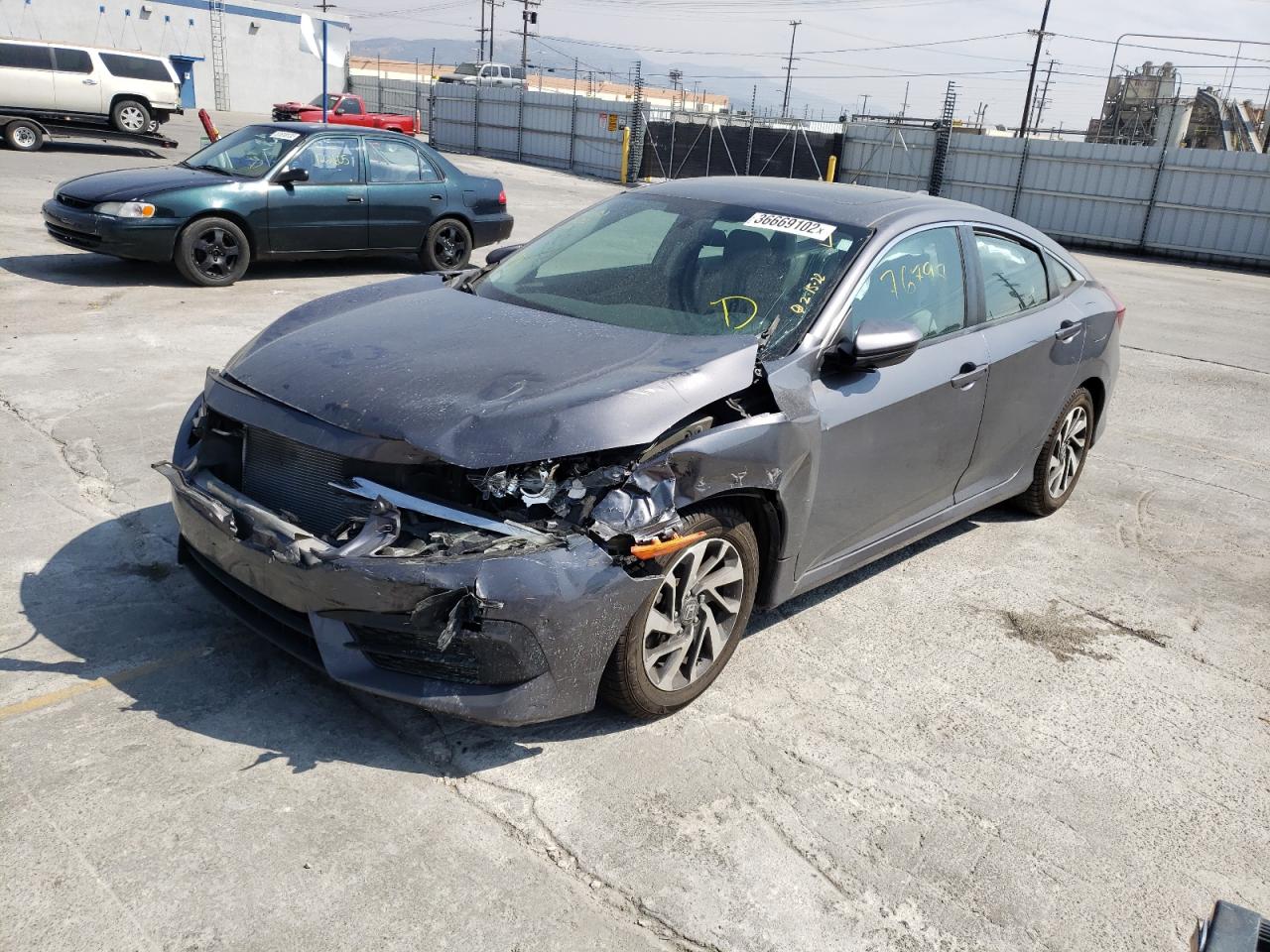 Photo 2 from auction – 2017 HONDA CIVIC EX with VIN 2HGFC2F78HH566398