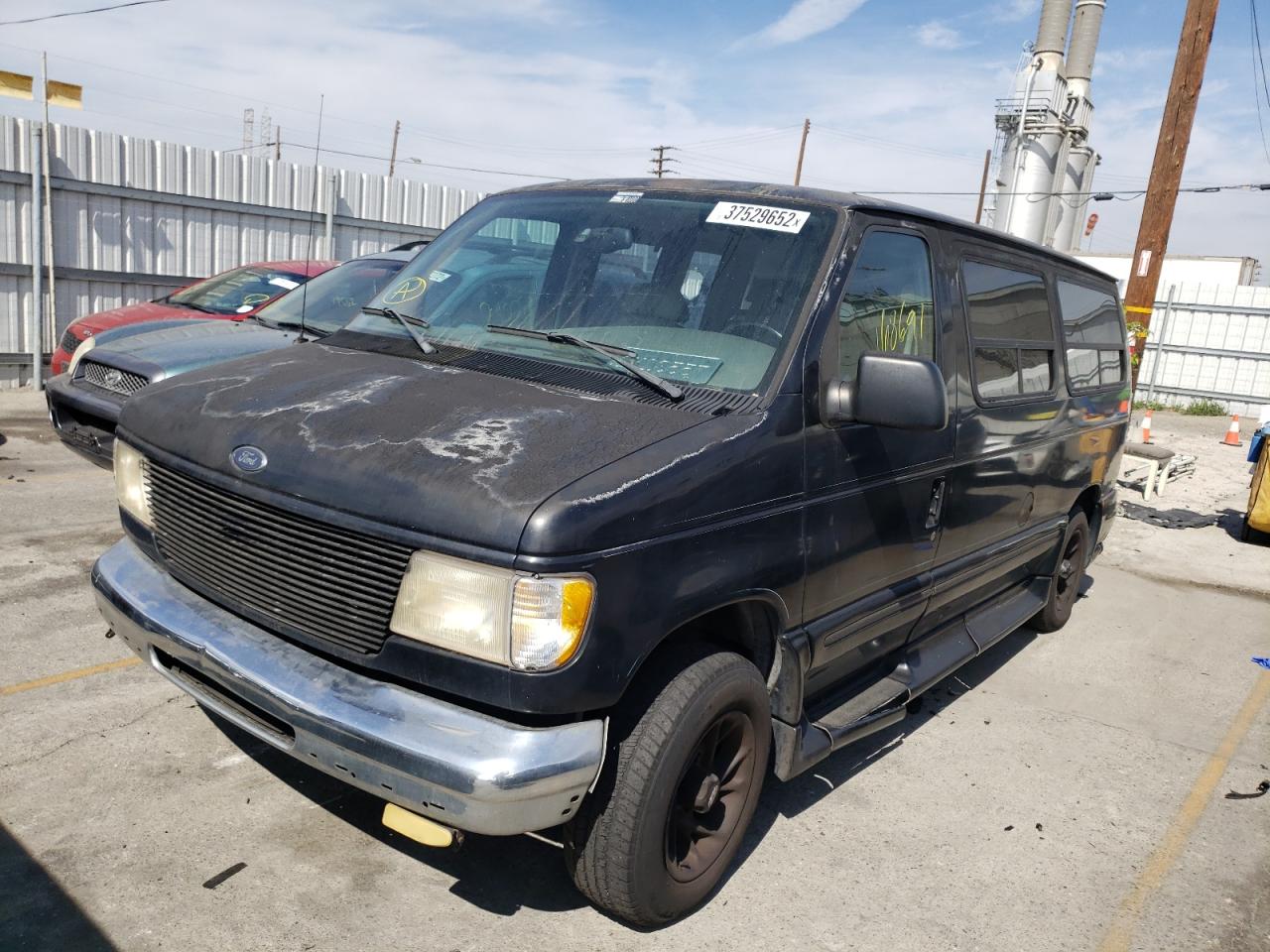 Photo 2 from auction – 1999 FORD ECONOLINE with VIN 1FDRE14L2XHB04113