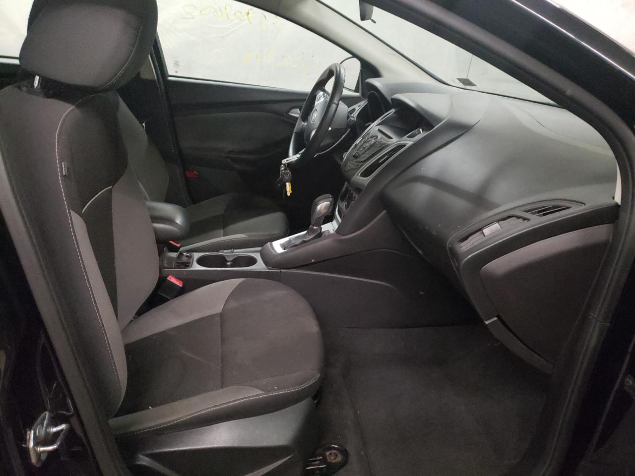 Photo 5 from auction – 2014 FORD FOCUS SE with VIN 1FADP3F22EL404906