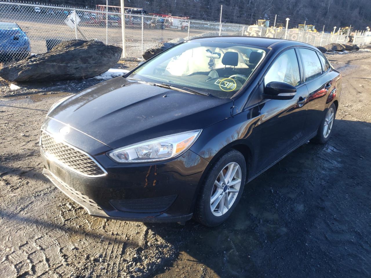 Photo 2 from auction – 2018 FORD FOCUS SE with VIN 1FADP3F23JL306848