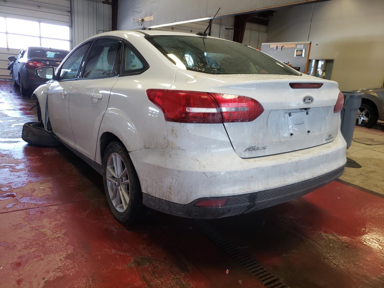 Photo 3 from auction – 2016 FORD FOCUS SE with VIN 1FADP3F20GL243636