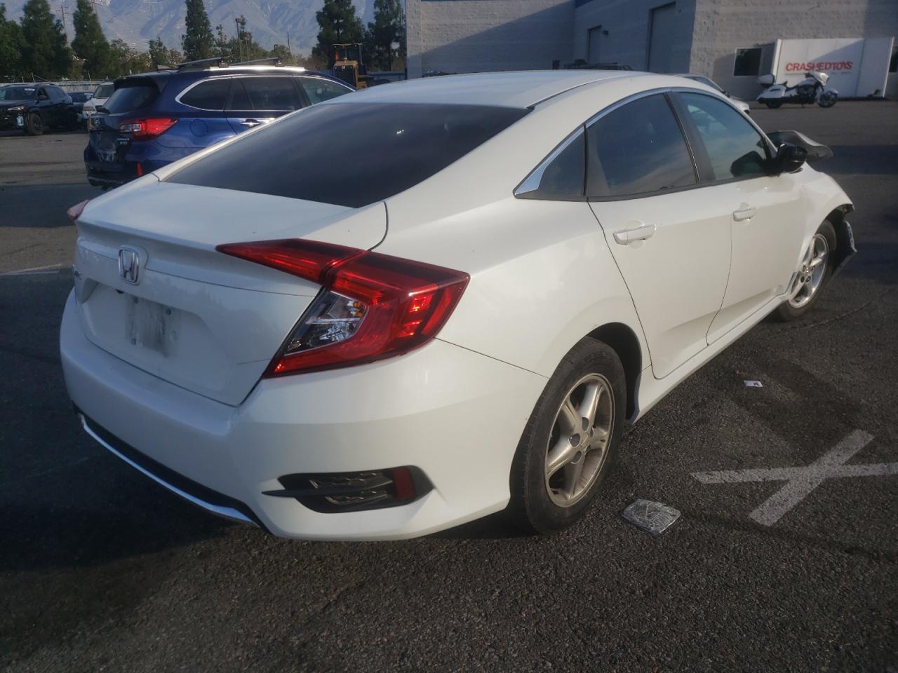 Photo 4 from auction – 2020 HONDA CIVIC LX with VIN 19XFC2F65LE202465