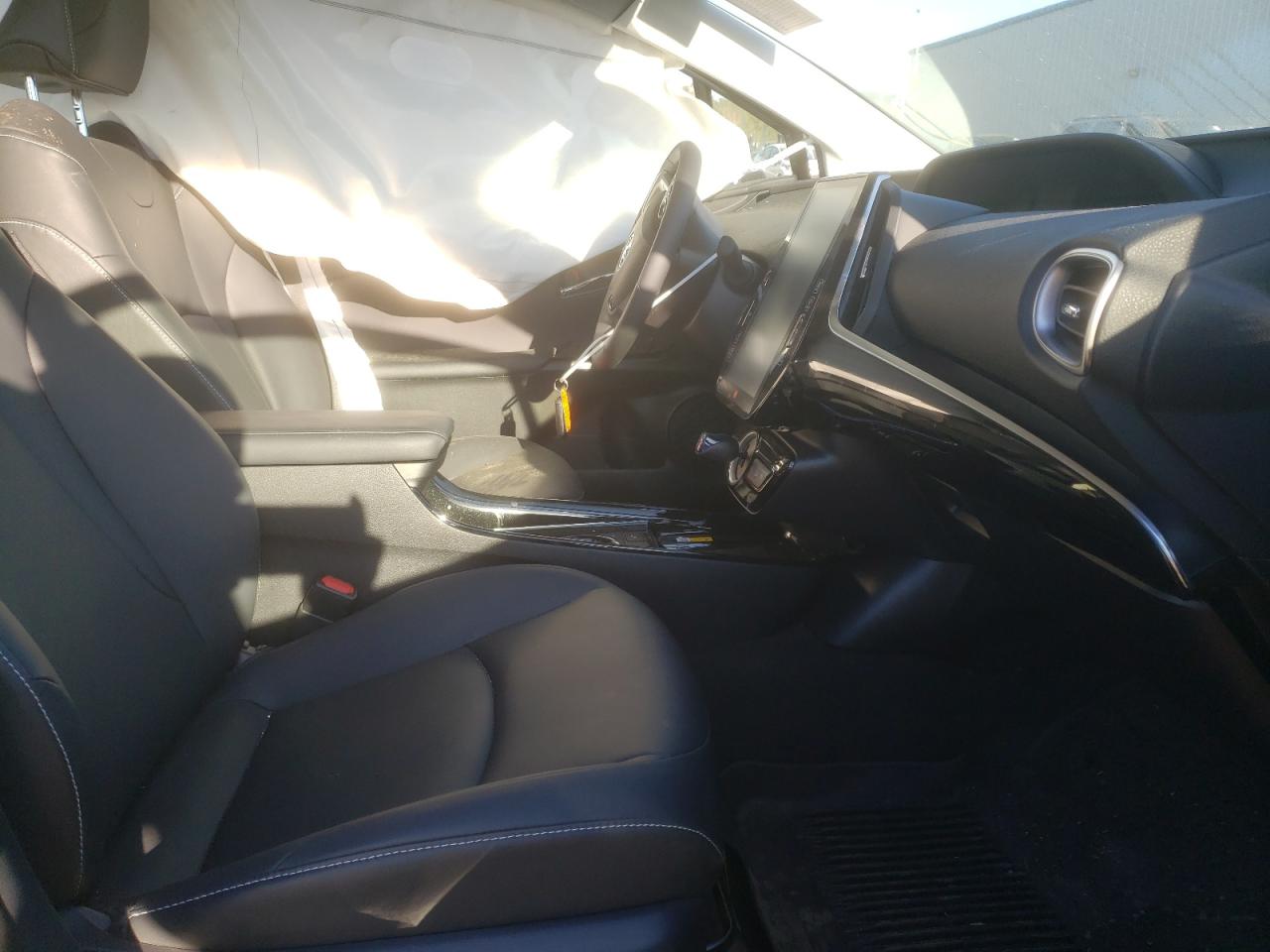 Photo 5 from auction – 2021 TOYOTA PRIUS PRIM with VIN JTDKAMFPXM3188306