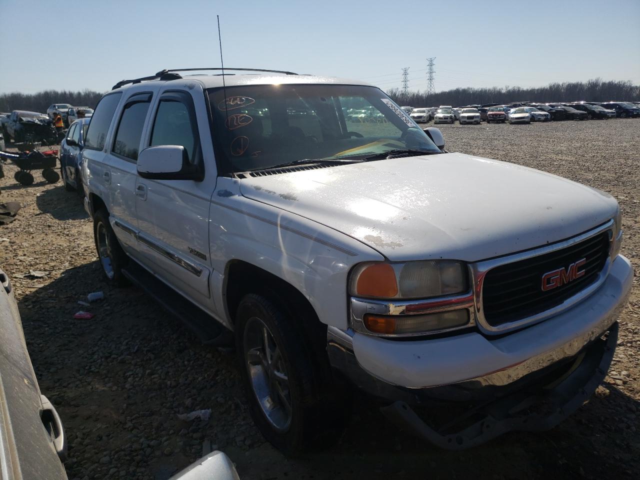 GMC YUKON 2000 with VIN 1GKEC13TXYJ107513 - Photo from auction