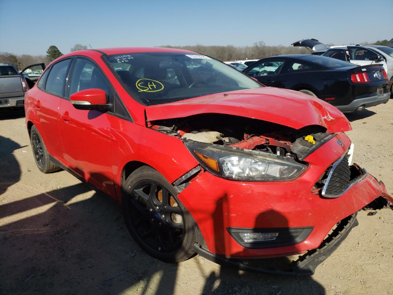 FORD FOCUS SE 2016 with VIN 1FADP3F27GL332846 - Photo from auction