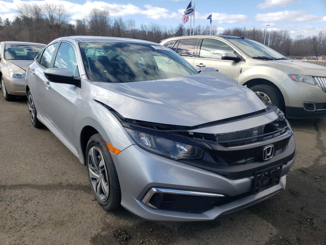 HONDA CIVIC LX 2019 with VIN 2HGFC2F63KH556294 - Photo from auction
