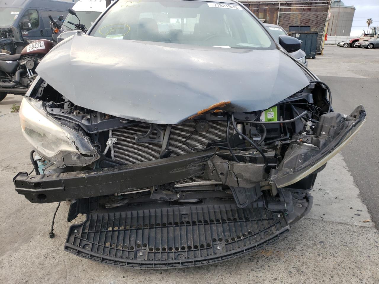 Photo 9 from auction – 2014 TOYOTA COROLLA L with VIN 5YFBURHE0EP010445
