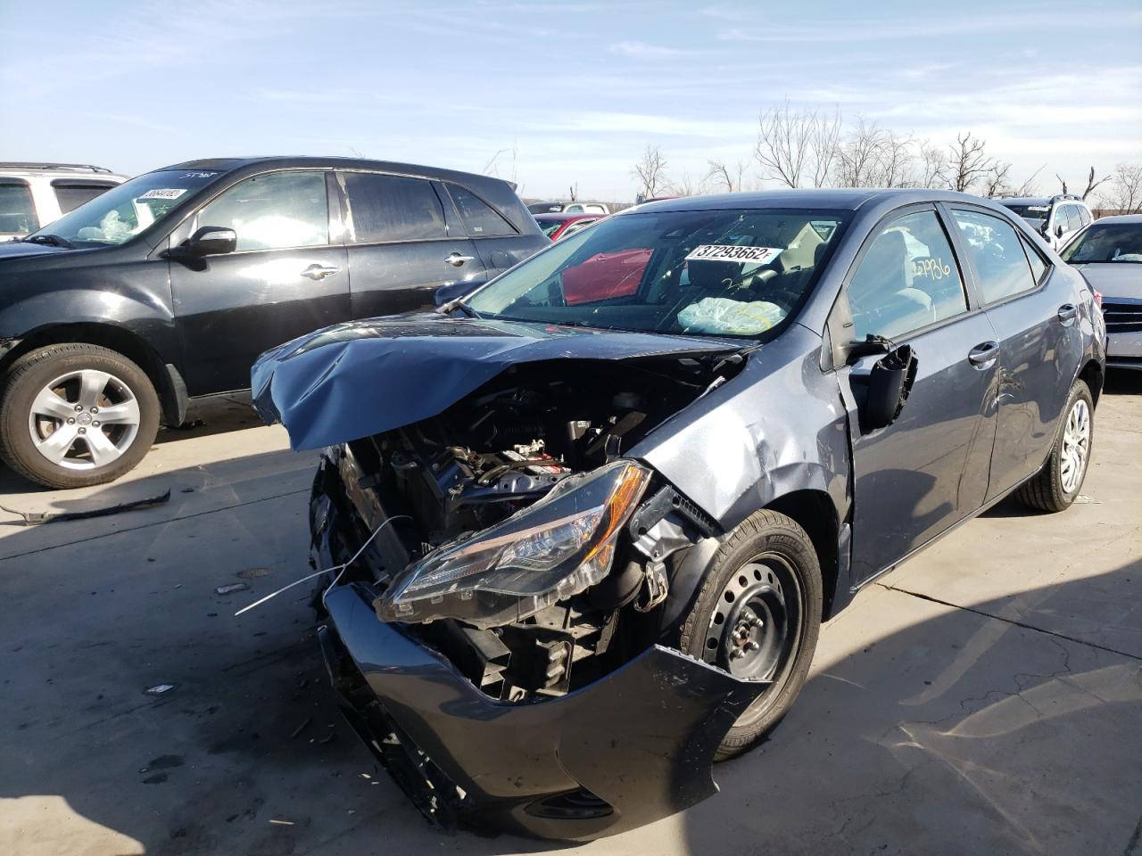 Photo 2 from auction – 2017 TOYOTA COROLLA L with VIN 5YFBURHEXHP705231