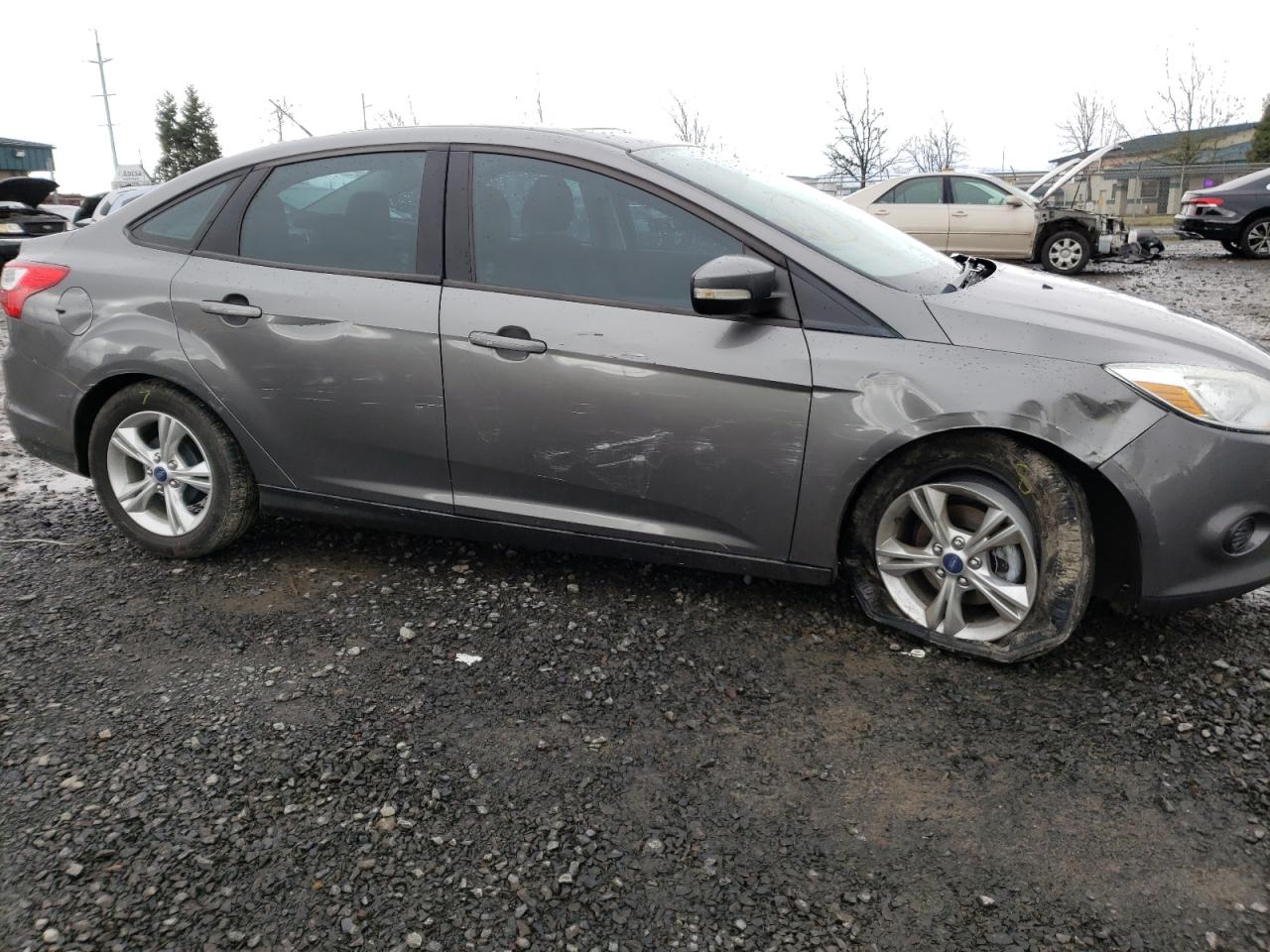 Photo 9 from auction – 2013 FORD FOCUS SE with VIN 1FADP3F21DL265060