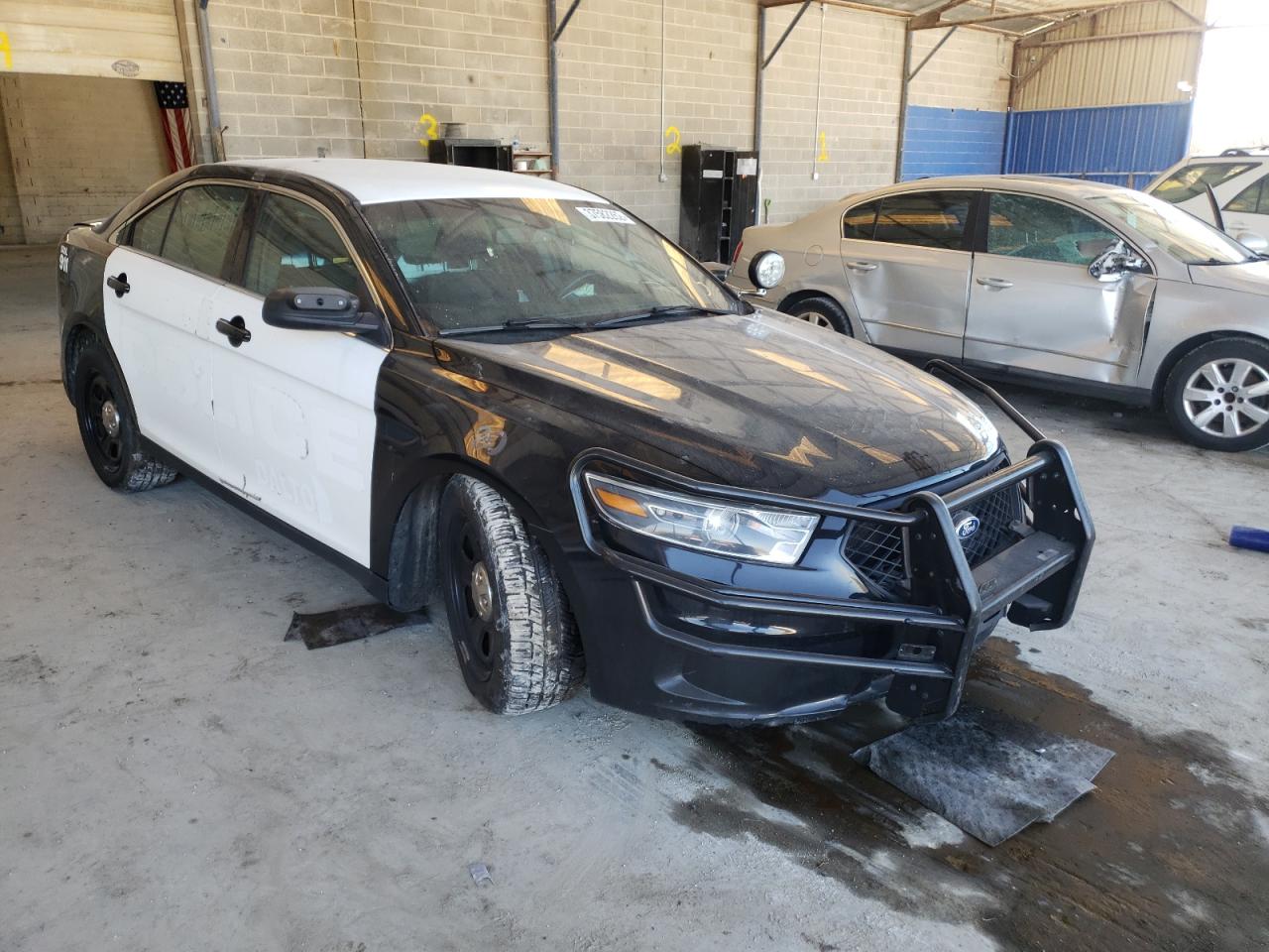 FORD TAURUS POL 2015 с VIN 1FAHP2MK0FG194265 - Фото с аукциона