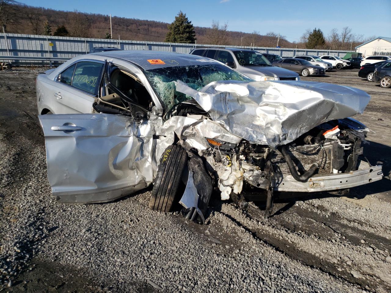 FORD TAURUS SE 2015 with VIN 1FAHP2D88FG158618 - Photo from auction