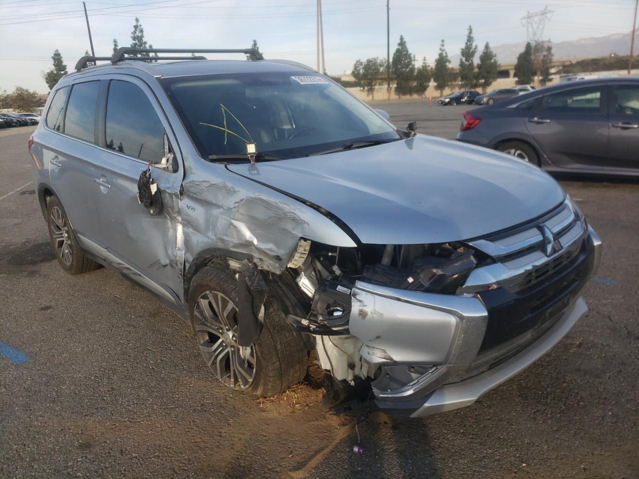 MITSUBISHI OUTLANDER 2016 with VIN JA4JZ4AX5GZ021584 - Photo from auction