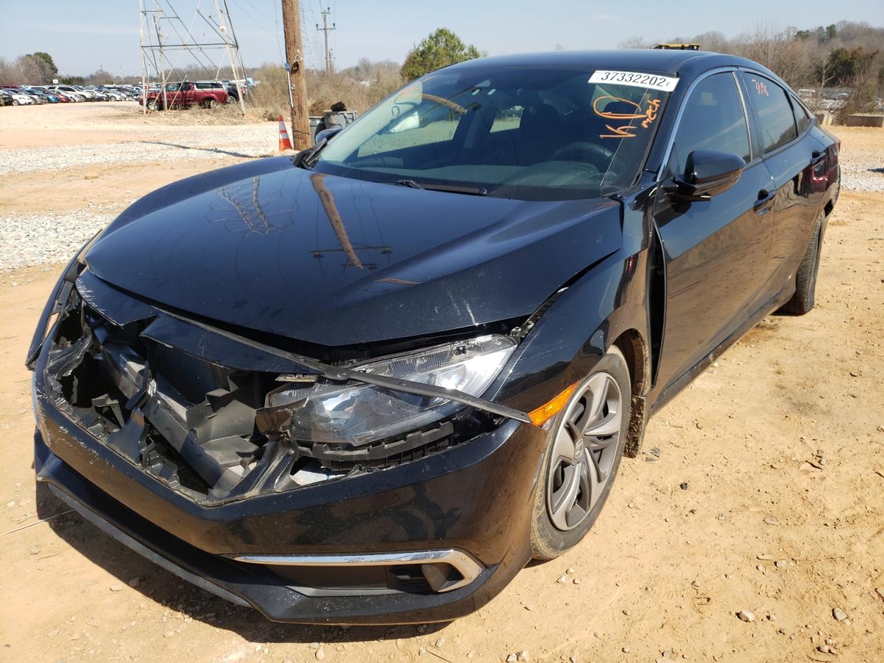 Photo 2 from auction – 2019 HONDA CIVIC LX with VIN 19XFC2F68KE034951