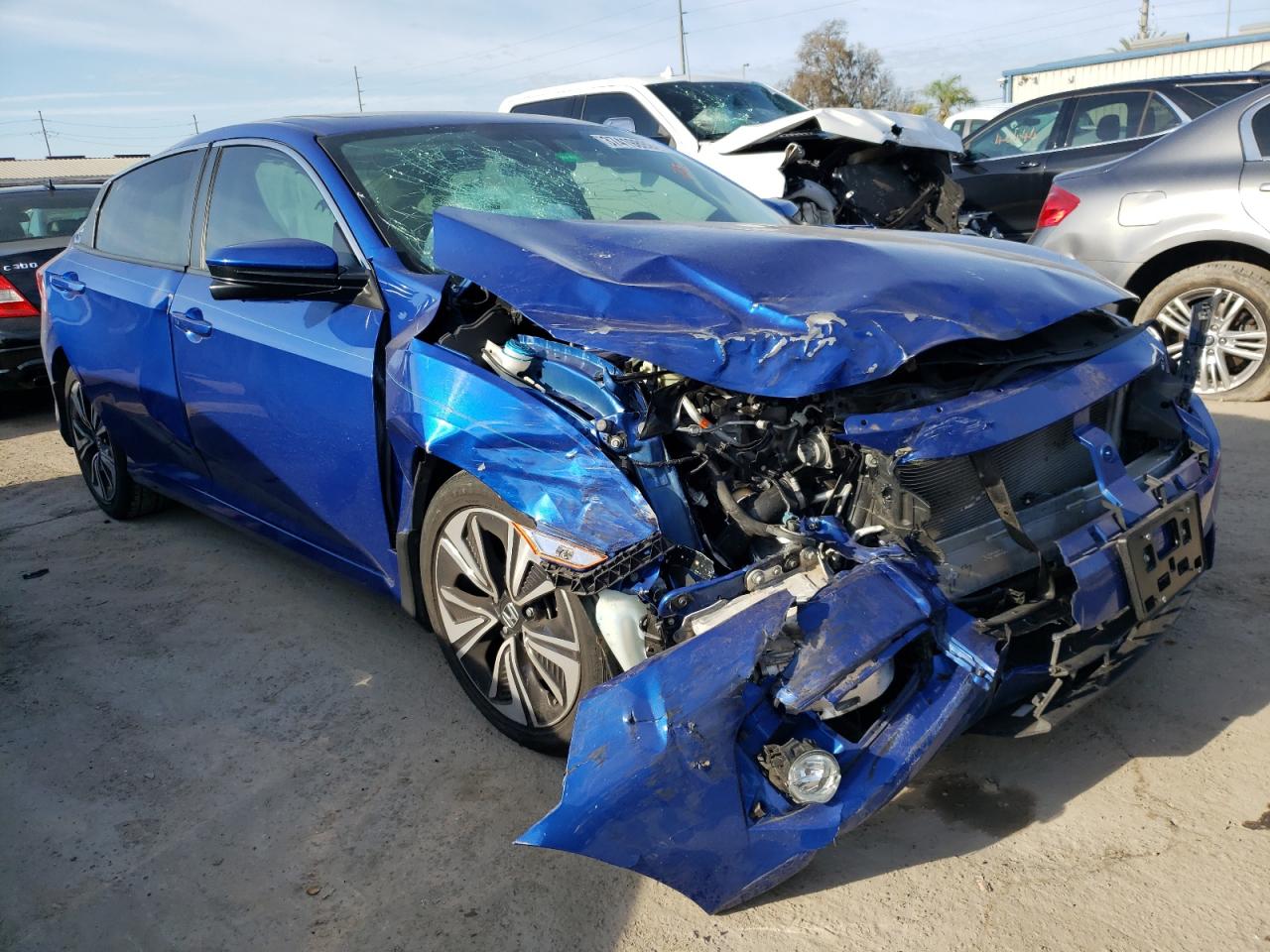 HONDA CIVIC EX 2017 with VIN 19XFC1F33HE005043 - Photo from auction