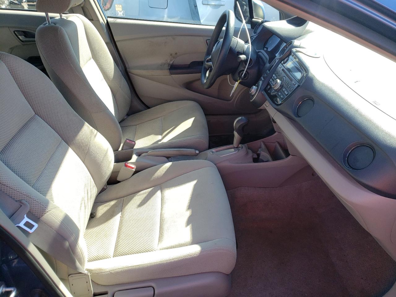 Photo 5 from auction – 2010 HONDA INSIGHT LX with VIN JHMZE2H50AS001433