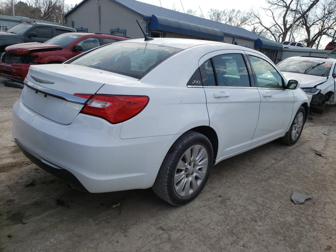 Photo 4 from auction – 2014 CHRYSLER 200 LX with VIN 1C3CCBAB3EN211790