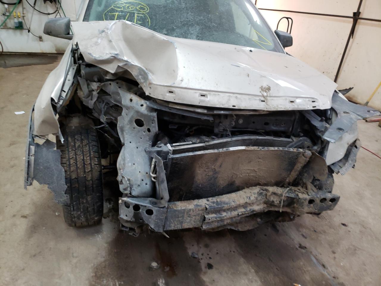Photo 9 from auction – 2011 GMC ACADIA SLE with VIN 1GKKRNED4BJ334914