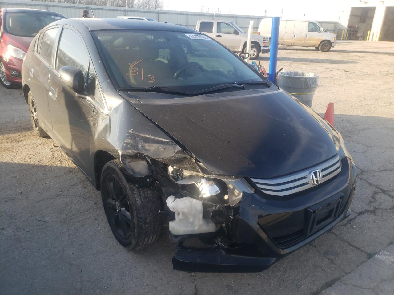 HONDA INSIGHT EX 2010 with VIN JHMZE2H79AS026557 - Photo from auction
