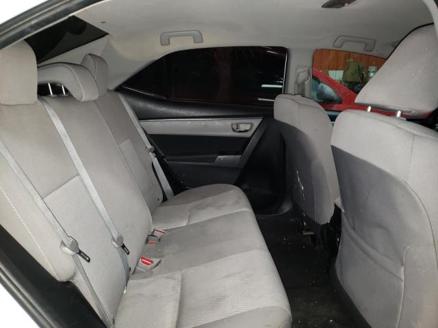 Photo 6 from auction – 2014 TOYOTA COROLLA EC with VIN 2T1BPRHEXEC118207