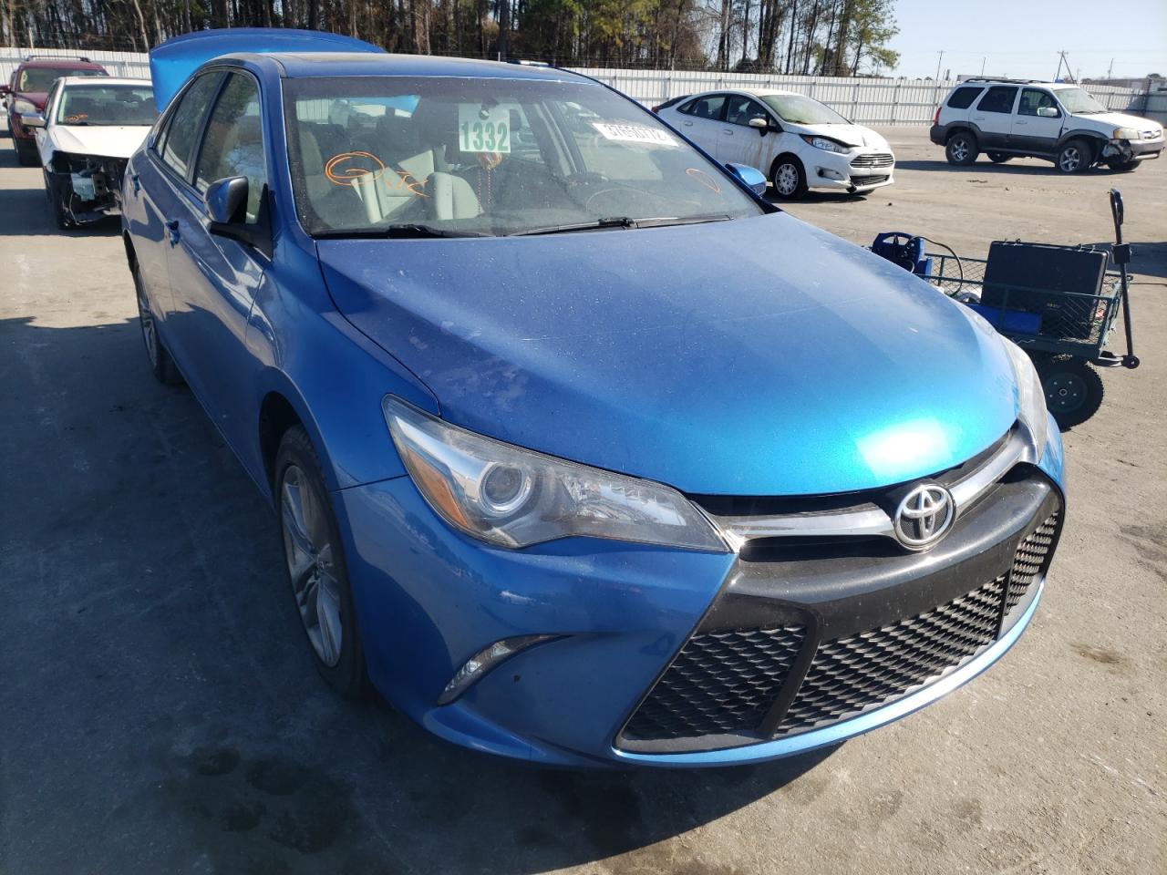 TOYOTA CAMRY LE 2017 with VIN 4T1BF1FKXHU698736 - Photo from auction