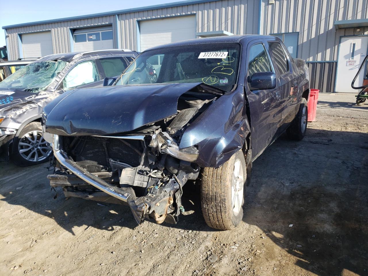 Photo 2 from auction – 2010 HONDA RIDGELINE with VIN 5FPYK1F56AB003260