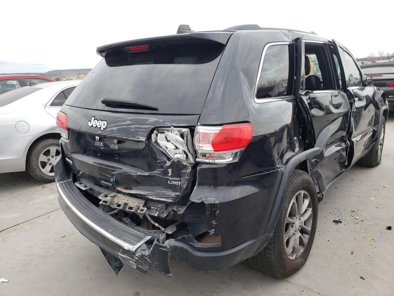 Photo 4 from auction – 2014 JEEP GRAND CHER with VIN 1C4RJEBM2EC390073