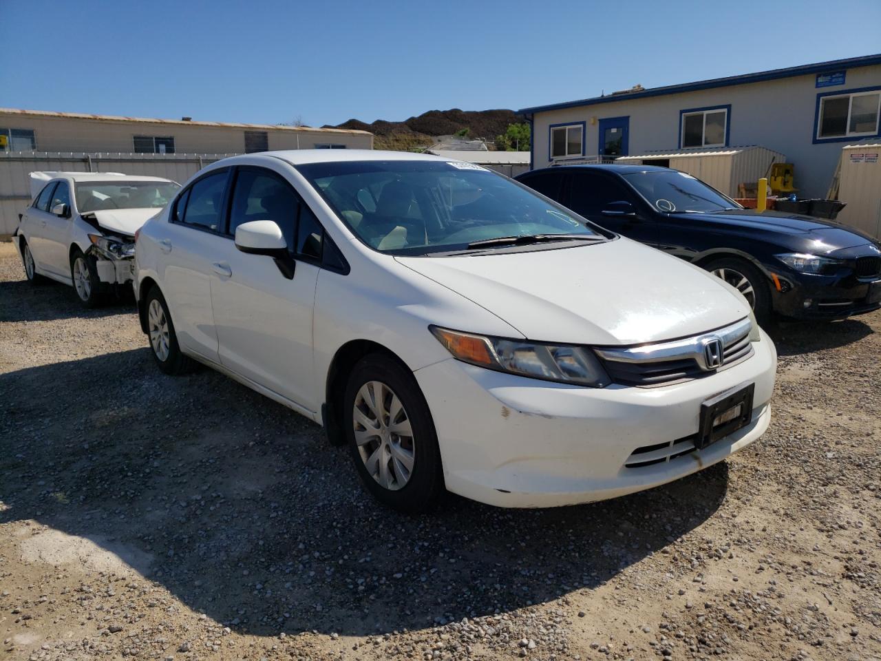 HONDA CIVIC LX 2012 with VIN 2HGFB2F59CH586783 - Photo from auction