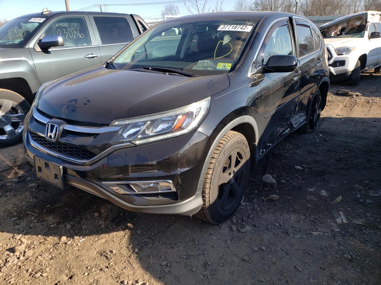 Photo 2 from auction – 2015 HONDA CR-V EX with VIN 2HKRM4H59FH602541