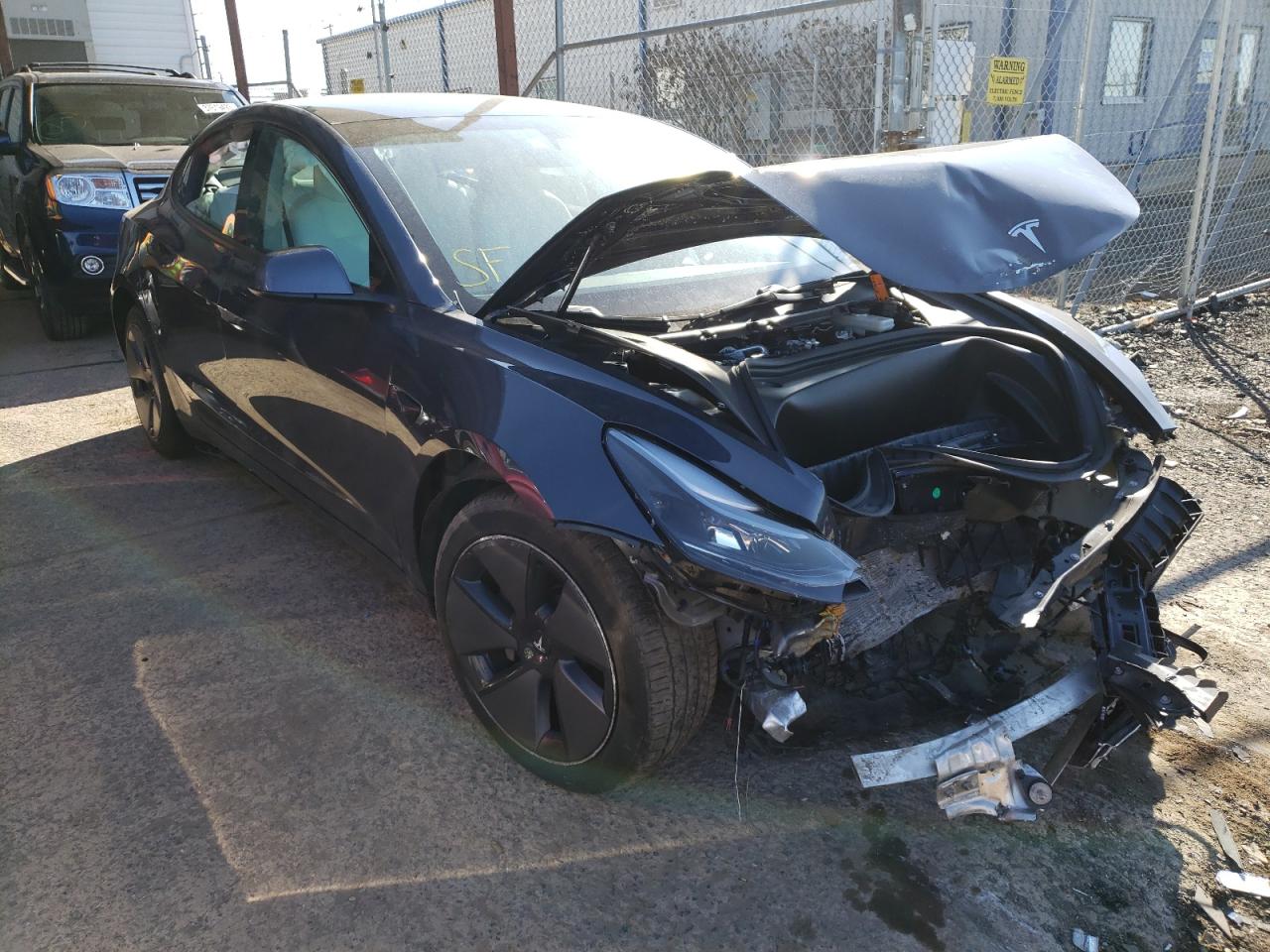 TESLA MODEL 3 2021 with VIN 5YJ3E1EBXMF903083 - Photo from auction