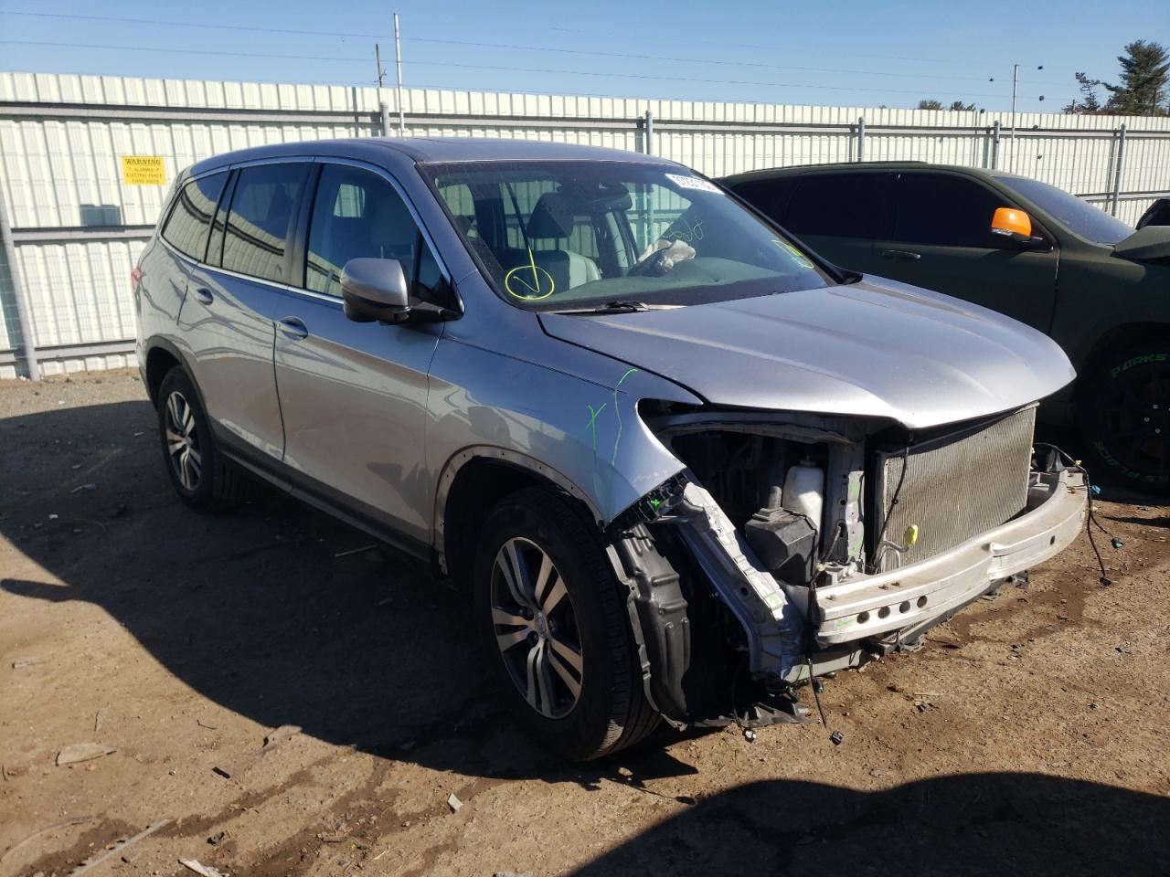 HONDA PILOT EXL 2016 with VIN 5FNYF6H69GB024497 - Photo from auction