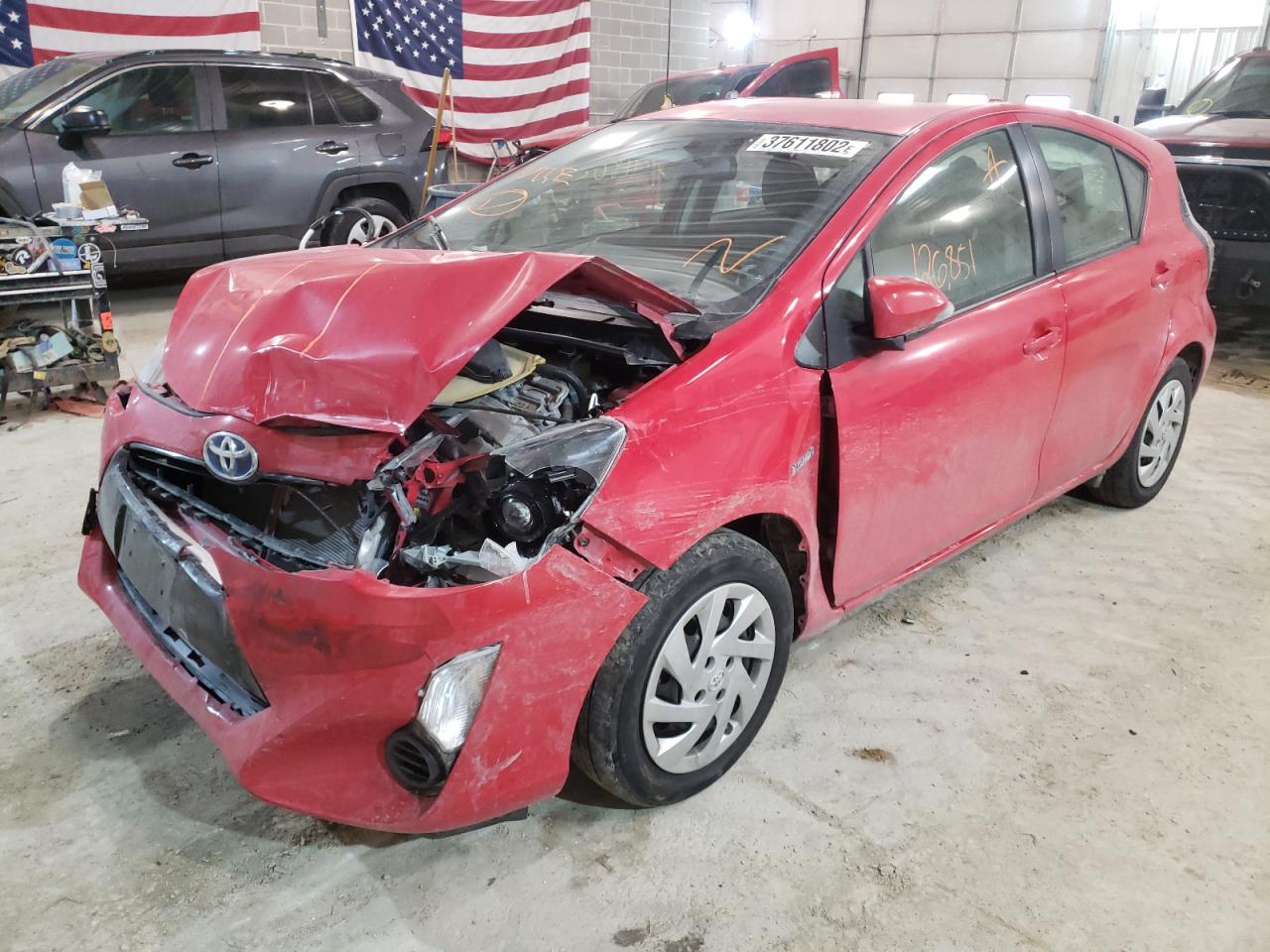 Photo 2 from auction – 2015 TOYOTA PRIUS C with VIN JTDKDTB38F1103501