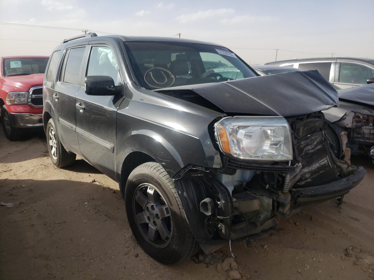 HONDA PILOT TOUR 2011 with VIN 5FNYF4H94BB041201 - Photo from auction
