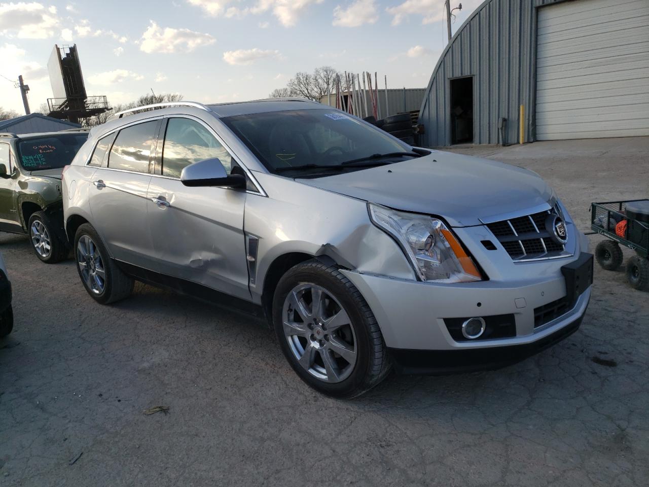 CADILLAC SRX PREMIU 2011 with VIN 3GYFNKE62BS585075 - Photo from auction