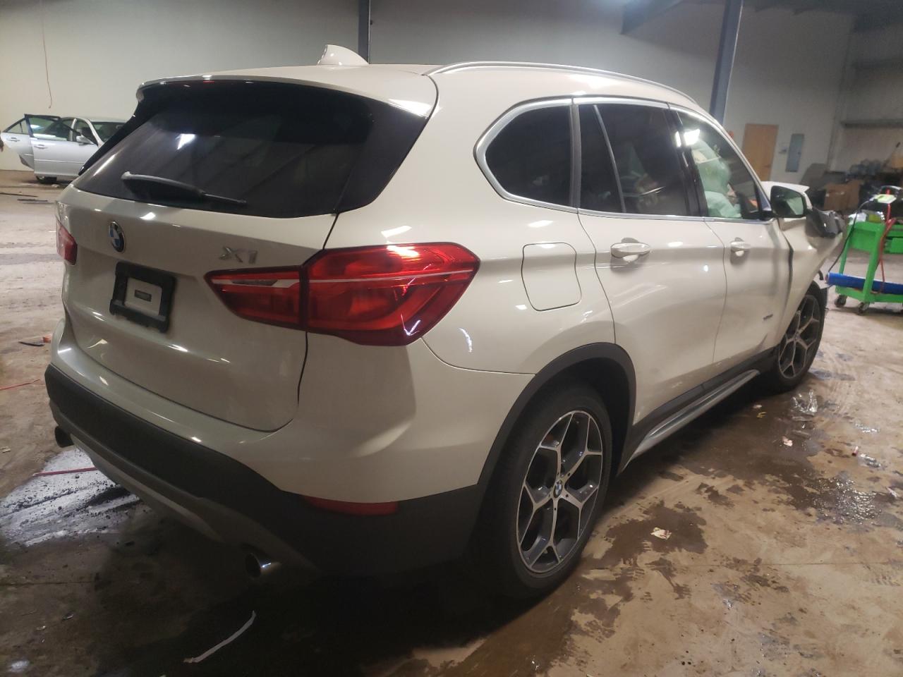 Photo 4 from auction – 2016 BMW X1 XDRIVE2 with VIN WBXHT3C34G5E54398